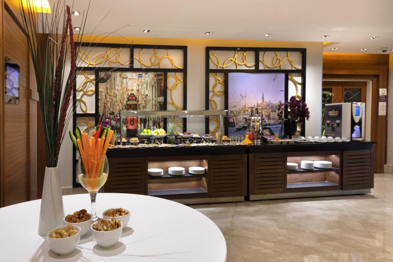머큐어 이스탄불 보몬티 호텔 외부 사진 A buffet at a hotel